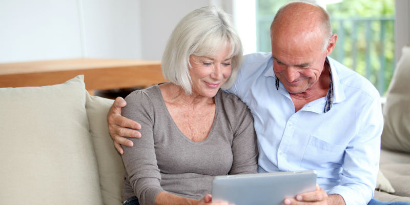 Old couple looking at tax options