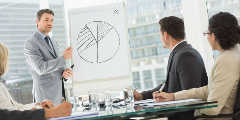 Business person presenting to the partners of the organization 